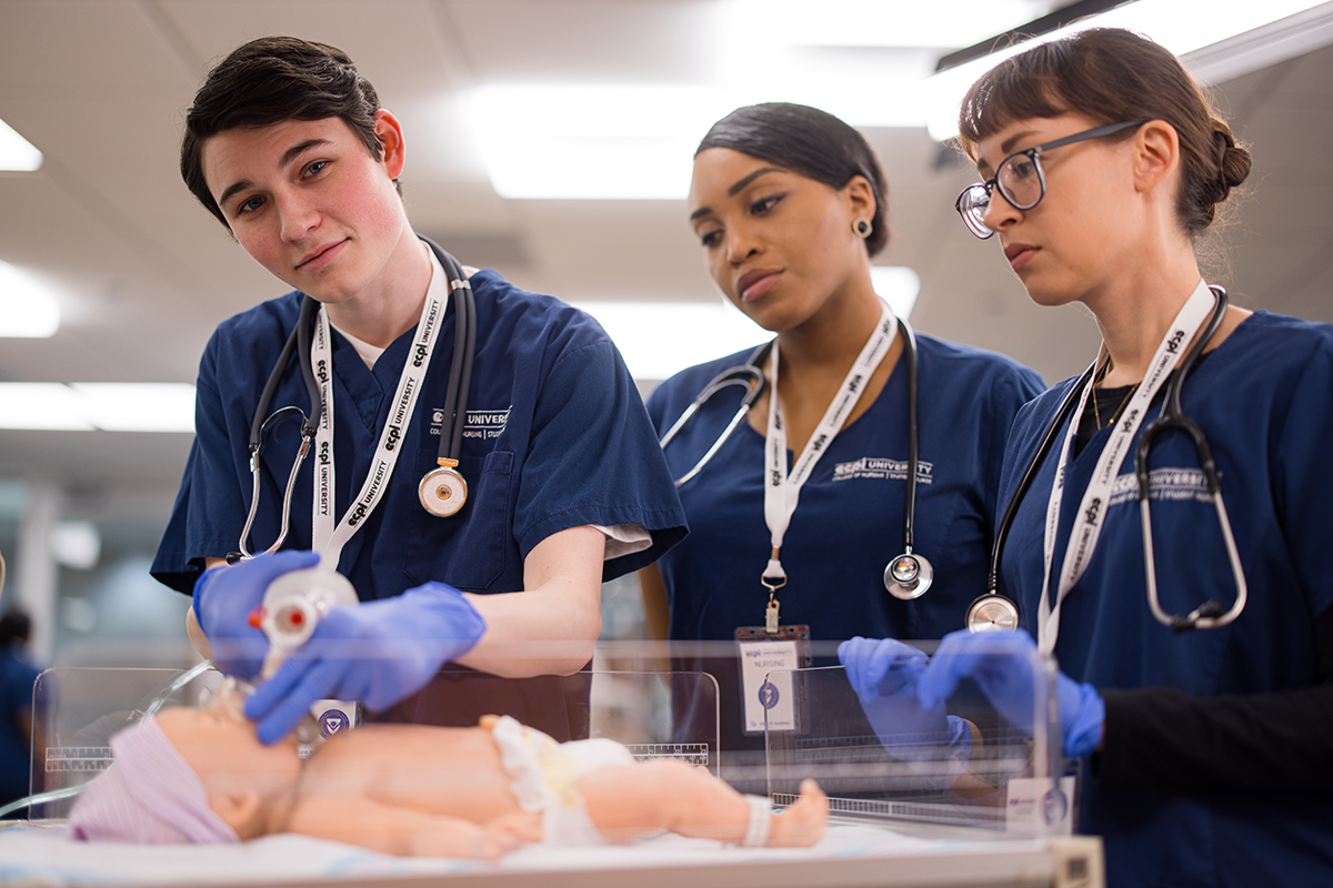 Nursing students learning hands-on