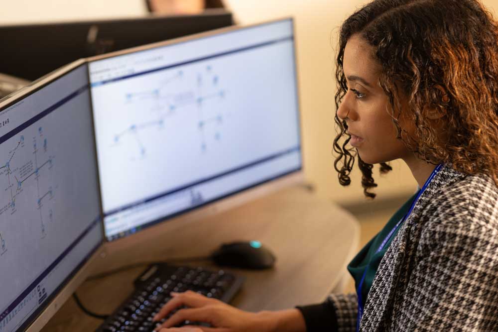 Cloud computing student working with technology systems