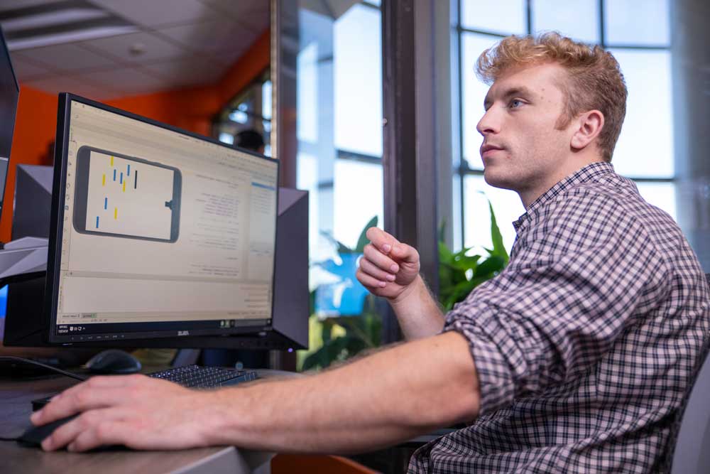 UX and web development student working on a digital project