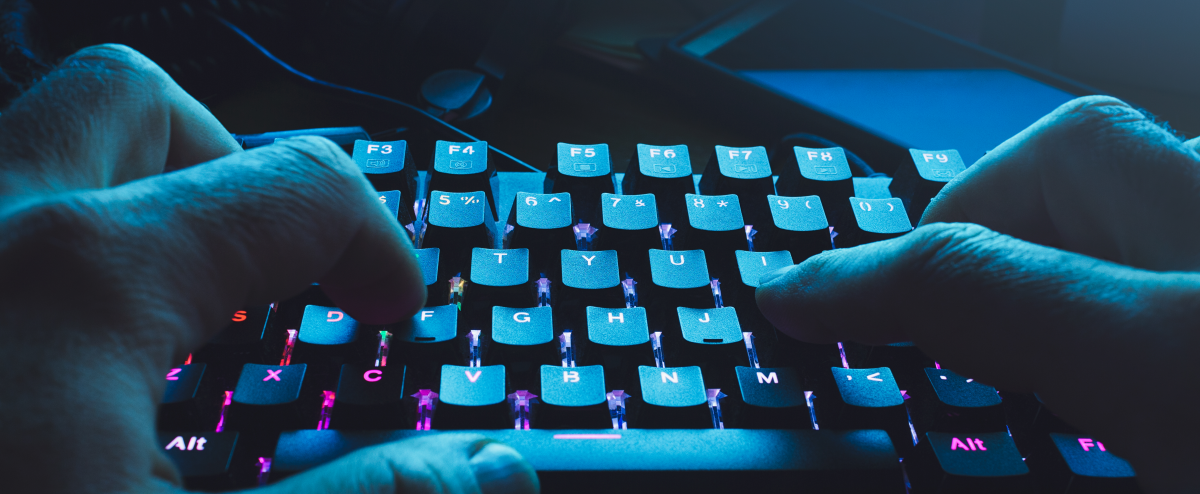 person typing on a keyboard